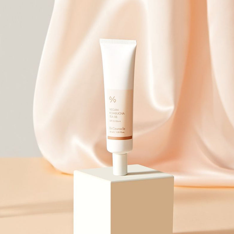 Dr.Ceuracle Vegan Kombucha Tea BB 30ml tube on a studio pedestal