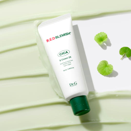 Dr.G Red Blemish Cica S Cream 2X 70ml tube at an angle on a pale green background