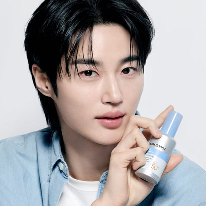 Model holding Dr.G Skin Boost PDRN Sun Serum SPF50+ PA++++ 50ml